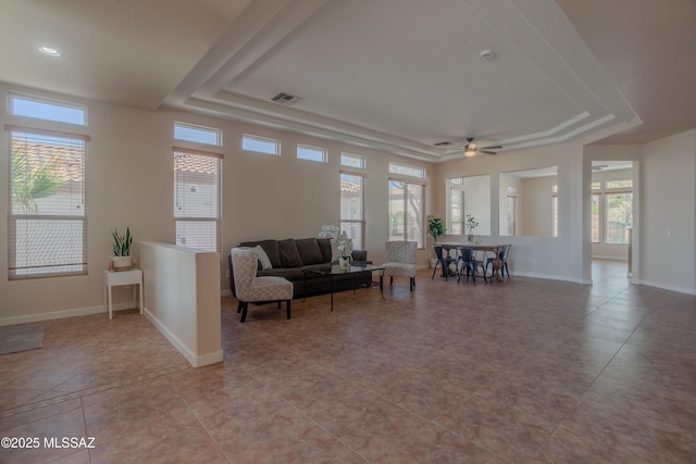 kitchen with a ceiling fan, open floor plan, white cabinets, appliances with stainless steel finishes, and visible vents