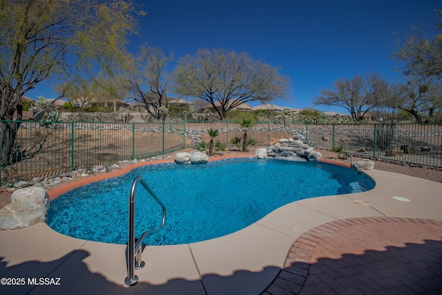 view of pool featuring a fenced in pool and fence
