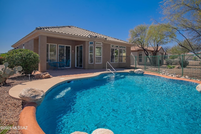 view of pool featuring fence, a patio area, and a fenced in pool