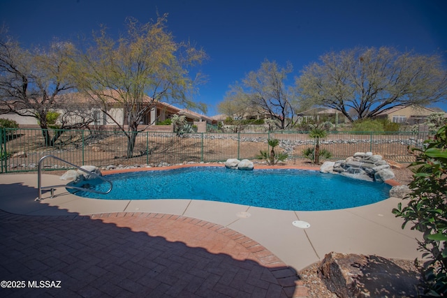 view of pool featuring a fenced in pool, a patio area, and fence
