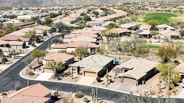 birds eye view of property with a residential view, golf course view, and a mountain view