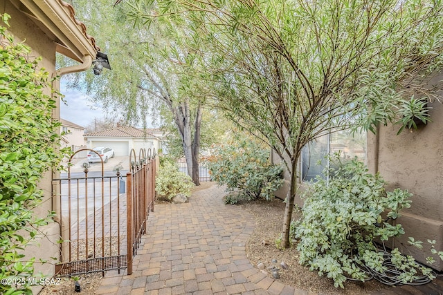 exterior space featuring a gate and fence