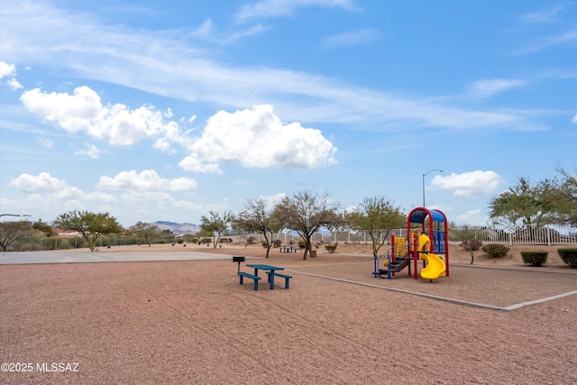 community play area featuring fence