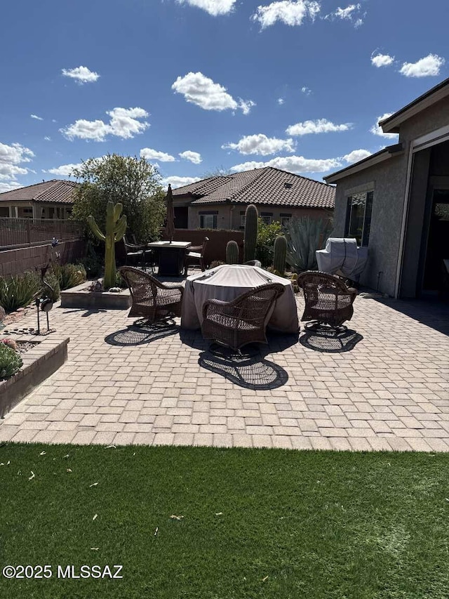 view of patio with fence