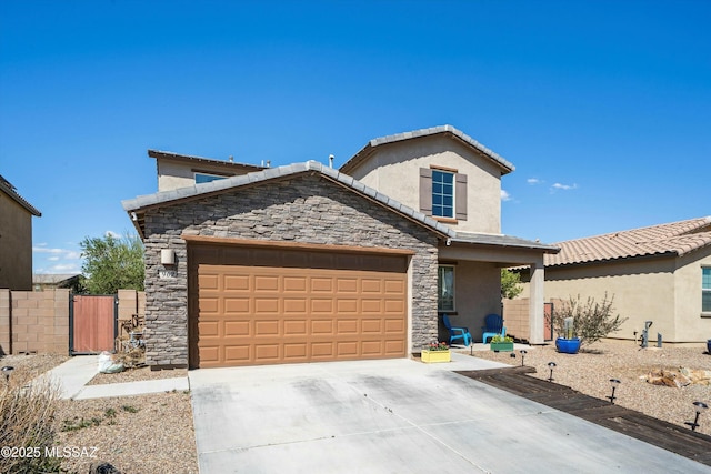 view of front facade featuring stucco siding, driveway, a gate, stone siding, and an attached garage