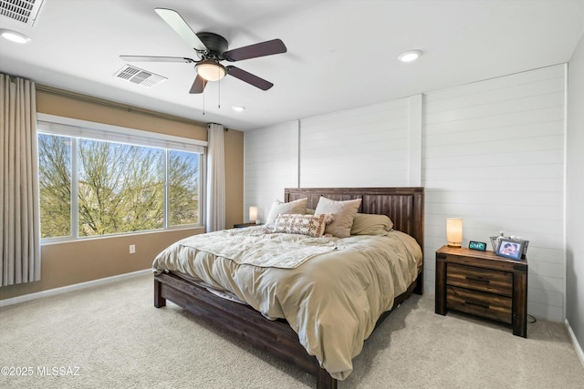 bedroom with recessed lighting, visible vents, light colored carpet, and a ceiling fan