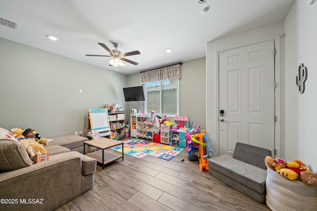 playroom featuring visible vents, recessed lighting, ceiling fan, and wood finished floors