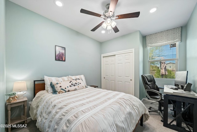 carpeted bedroom with recessed lighting, a closet, and ceiling fan