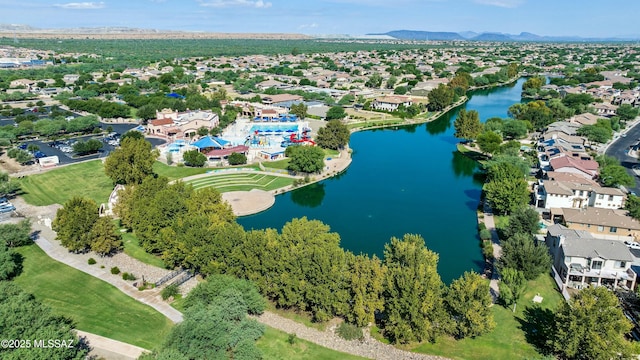 bird's eye view with a residential view and a water and mountain view