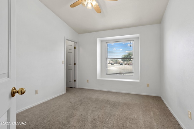 unfurnished room featuring baseboards, ceiling fan, and carpet flooring