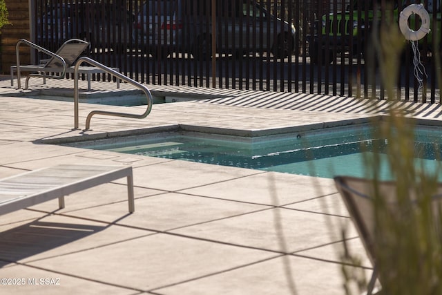 view of pool with a swimming pool and a patio area