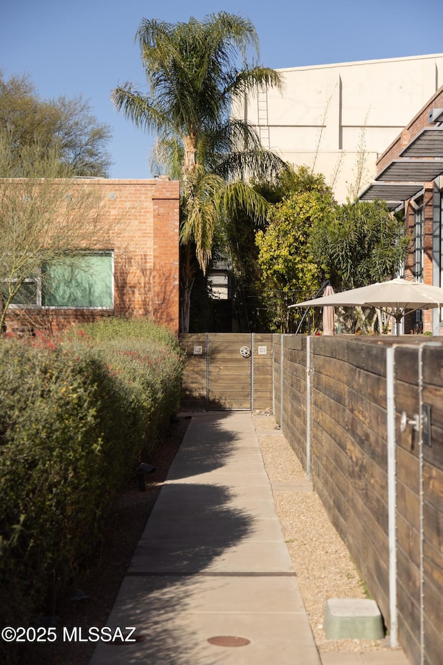 view of yard with a gate and fence