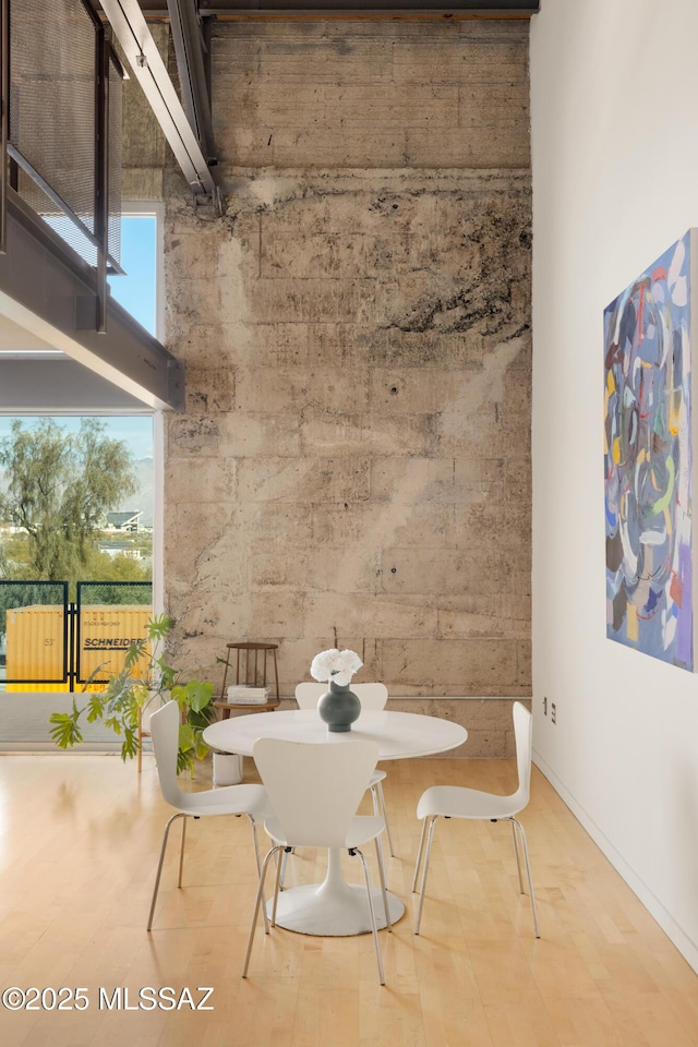 dining space with a high ceiling