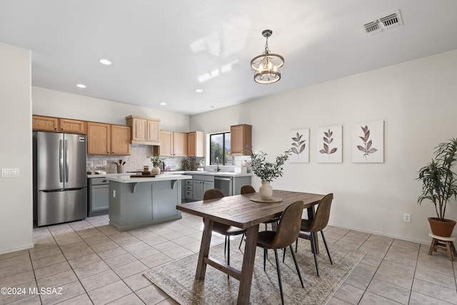 dining space featuring a notable chandelier, recessed lighting, visible vents, and light tile patterned floors