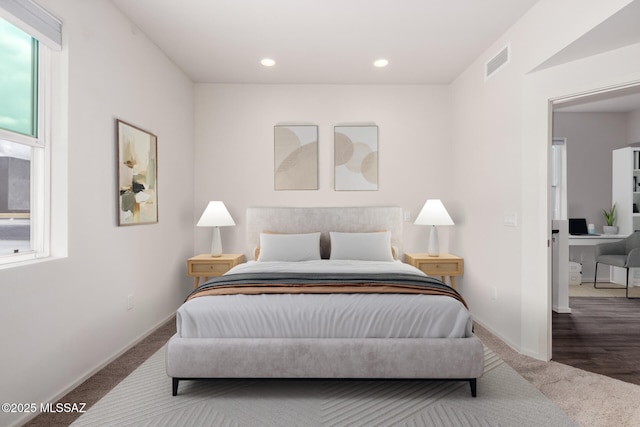 bedroom with recessed lighting, visible vents, carpet flooring, and baseboards