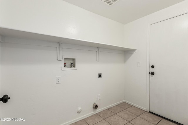 clothes washing area featuring hookup for a washing machine, visible vents, hookup for an electric dryer, laundry area, and light tile patterned flooring