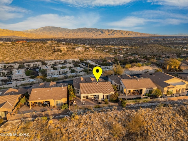 aerial view featuring a mountain view and a residential view