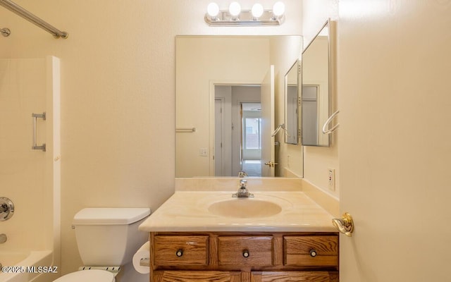 full bath with vanity,  shower combination, and toilet