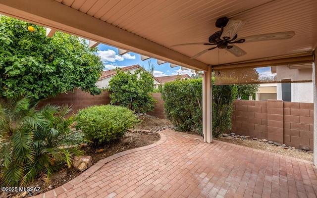 view of patio with a ceiling fan and a fenced backyard