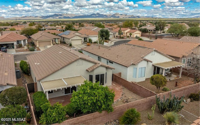 bird's eye view with a mountain view and a residential view