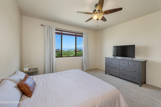 carpeted bedroom featuring a ceiling fan