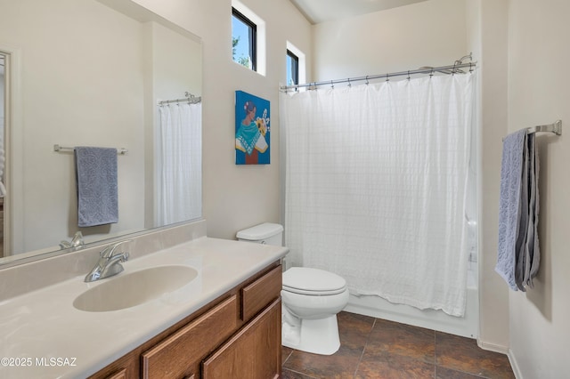 full bath featuring toilet, vanity, and shower / tub combo with curtain