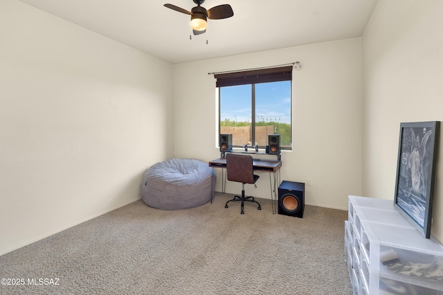 office area with carpet flooring and a ceiling fan