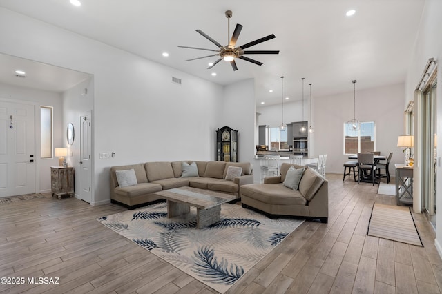 3337 E Wet Sand Pl, Vail, AZ 85641 - living area featuring light wood-style flooring, a ceiling fan, and recessed lighting