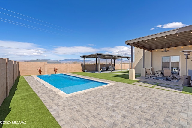 3337 E Wet Sand Pl, Vail, AZ 85641 - view of pool with ceiling fan, a fenced backyard, and a patio area