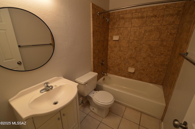 bathroom with vanity, tile patterned floors, toilet, and shower / bathtub combination