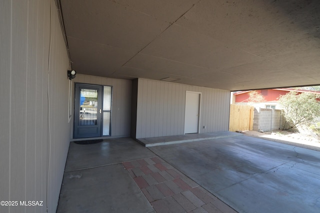 garage with fence