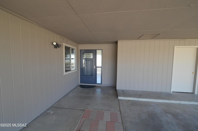 entrance to property featuring visible vents