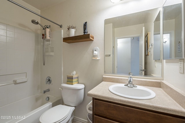 bathroom with toilet, vanity, and shower / bathing tub combination