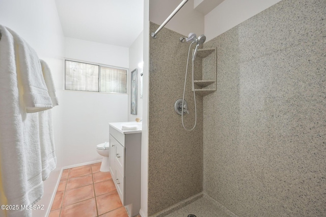 bathroom with tile patterned floors, toilet, vanity, and a shower