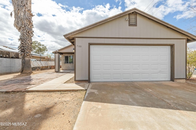 garage with fence