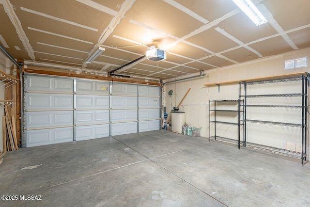 garage featuring a garage door opener