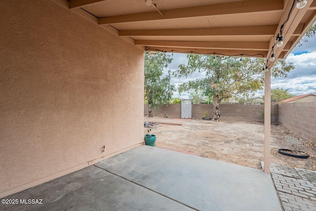 view of patio with a fenced backyard