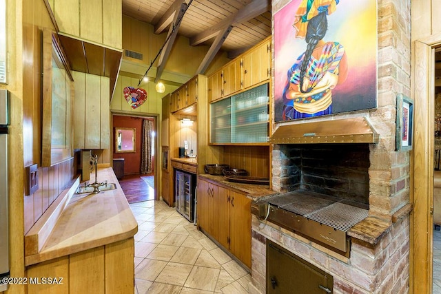 3435 E Via Guadalupe, Tucson, AZ 85716 - kitchen featuring beverage cooler, visible vents, light tile patterned flooring, wood ceiling, and lofted ceiling with beams