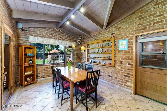 3435 E Via Guadalupe, Tucson, AZ 85716 - dining room with brick wall, wooden ceiling, and lofted ceiling with beams