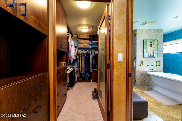 3435 E Via Guadalupe, Tucson, AZ 85716 - walk in closet featuring visible vents and light tile patterned floors