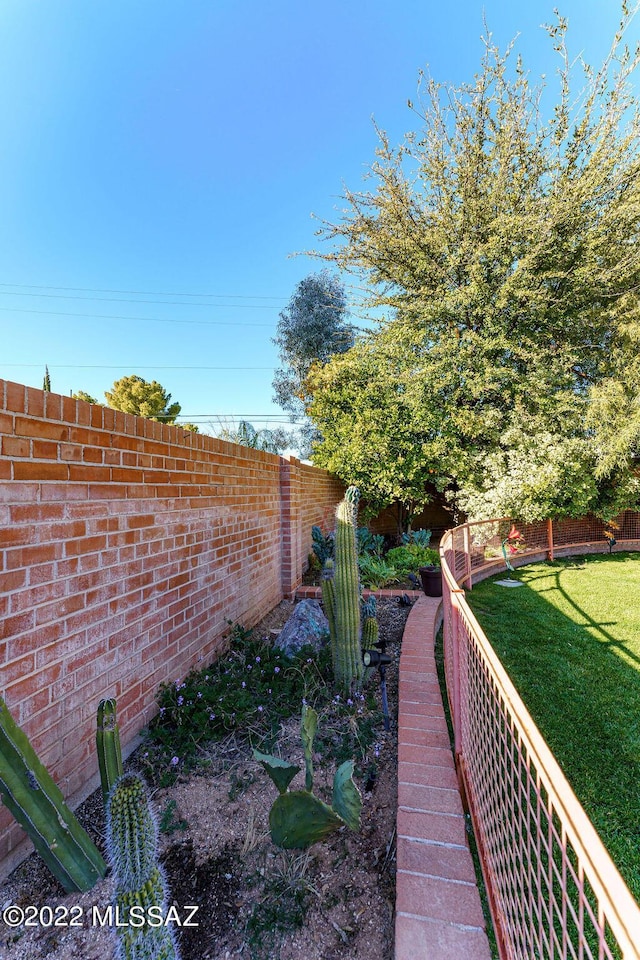 3435 E Via Guadalupe, Tucson, AZ 85716 - view of yard featuring a fenced backyard