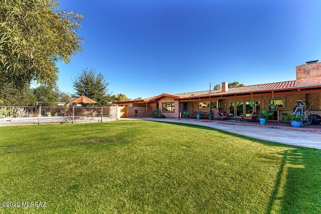 3435 E Via Guadalupe, Tucson, AZ 85716 - view of yard with a patio area and fence