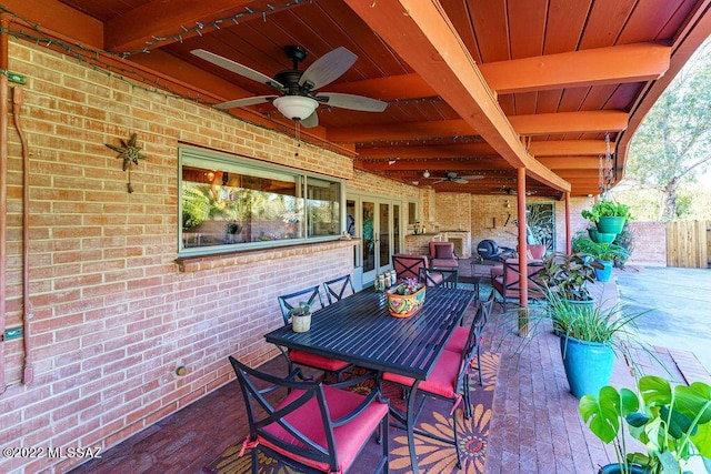 3435 E Via Guadalupe, Tucson, AZ 85716 - view of patio / terrace featuring outdoor dining area, fence, and a ceiling fan