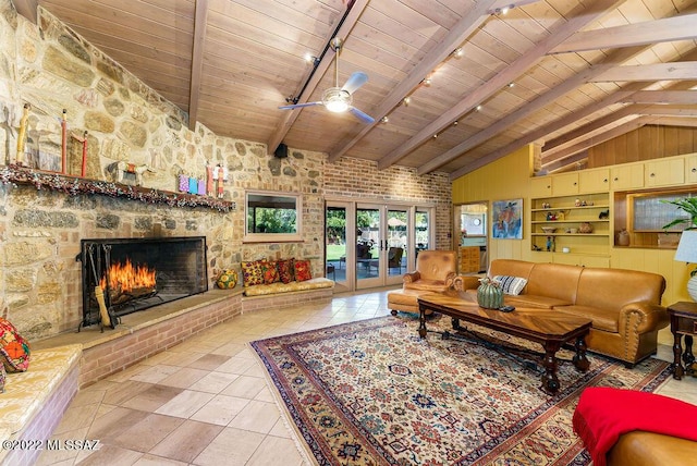 3435 E Via Guadalupe, Tucson, AZ 85716 - living room with high vaulted ceiling, a ceiling fan, wood ceiling, a fireplace, and beam ceiling