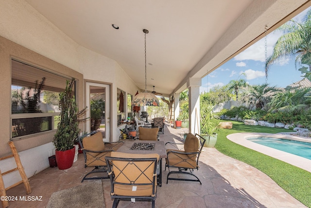 view of patio with an outdoor fire pit