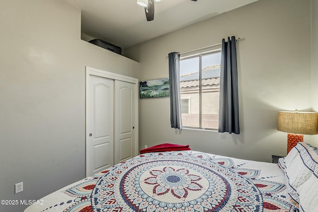 bedroom featuring a closet and ceiling fan