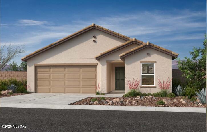 9512 E Meola Dr, Tucson, AZ 85747 - mediterranean / spanish home with concrete driveway, a tiled roof, a garage, and stucco siding