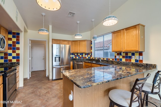 1181 W Placita Lucinda, Green Valley, AZ 85614 - kitchen featuring visible vents, dark stone countertops, stainless steel appliances, a peninsula, and decorative backsplash