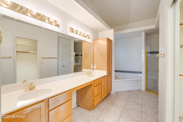 1181 W Placita Lucinda, Green Valley, AZ 85614 - bathroom featuring a sink, double vanity, a bath, and tile patterned floors