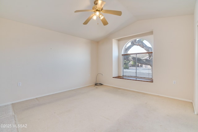 1181 W Placita Lucinda, Green Valley, AZ 85614 - spare room with ceiling fan, vaulted ceiling, baseboards, and light carpet